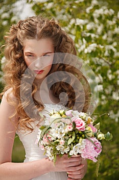 Young bride with flowers