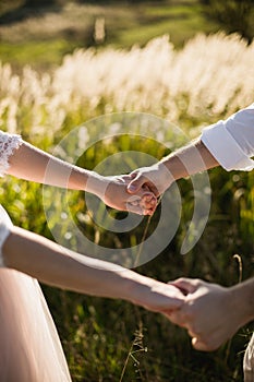 Young Bride and Groom couple in garden. Love and tenderness