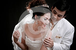 Young bride and groom in erotic emotio