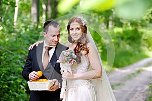 Young bride and groom taking a walk