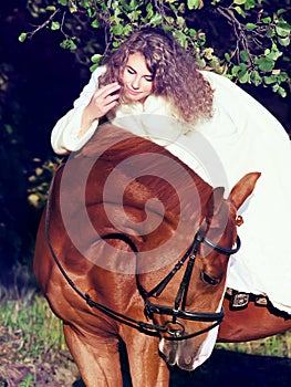Young bride riding on red horse