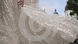 Young bride in wedding dress circling in a old city. element rotates bride wedding dress