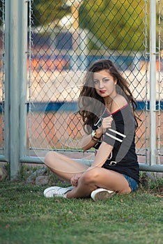 A young bright teen girl loves sports.street fashion of contemporary youth girl.