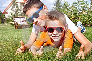 Young brothers playing in the garden.