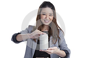 Young brunette businesswoman presenting a can of soft drink