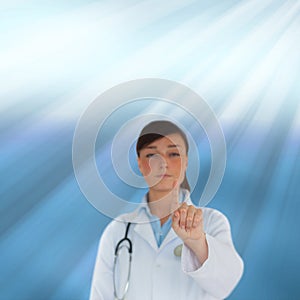 Young brunette doctor pointing