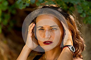 Young brunette female with radiant smile