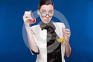 Young brunette with flasks