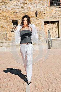 Young brunette wearing elegant tailleur