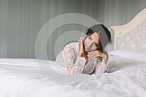 Young brunette woman boudoir