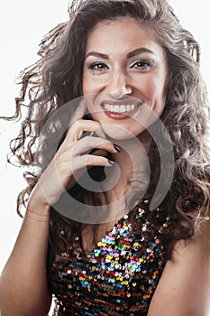 Young brunette woman with curly hairstyle in fancy glamur dress isolated on white background gesturing emotional