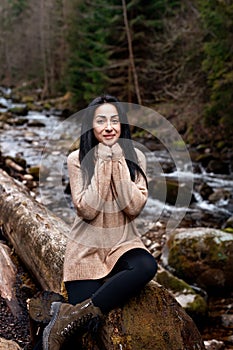 Young brunette woman explores new, magical, and fantastic places around the world. Portrait of cute young female