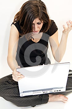 Young Brunette Woman Get Bad News On Computer