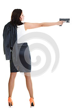 Young brunette woman with gun isolated on white