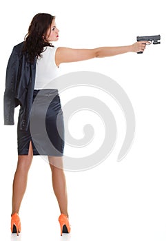 Young brunette woman with gun isolated on white