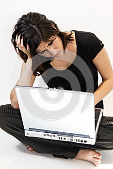 Young Brunette Woman Has Computer Problems