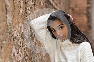 Young brunette woman looking at camera