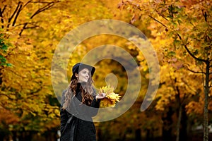 Young brunette woman portrait in autumn color