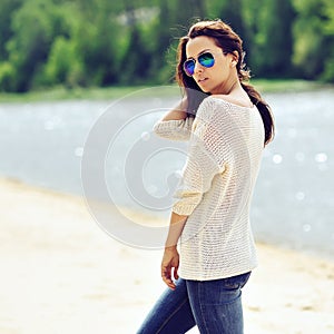 Young brunette woman portrait outdoor