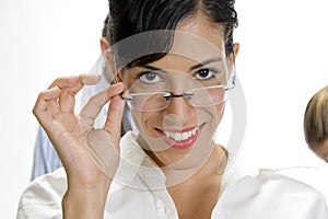 Young brunette woman posing with her eyewear