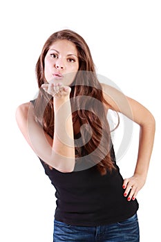 Young brunette woman sends air kiss