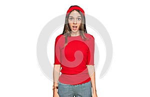 Young brunette woman wearing casual clothes afraid and shocked with surprise and amazed expression, fear and excited face