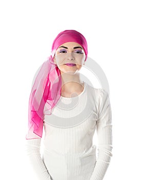 Young brunette woman wearing pink head scarf