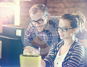 Young business couple in the office