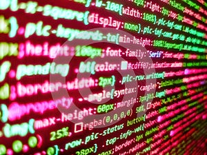 Young business crew working with startup. Data encryption security code on a computer display. Javascript functions, variables,