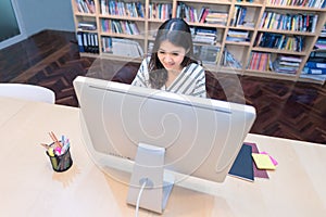 Young business entrepreneur working on the smart computer