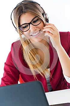 Young business girl using her computer.