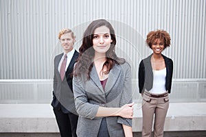 Young business group standing together at office