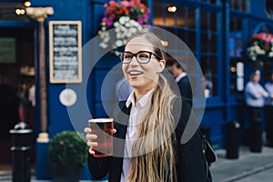 Young business lady with beer.