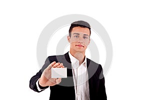 Young business man handing a blank business card over white back