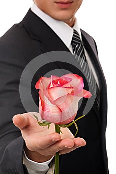 Young business man hold rose