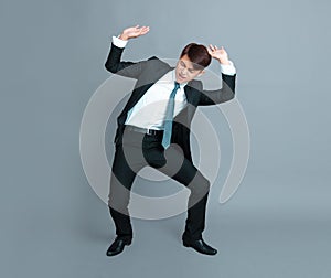 Young business man lifting something
