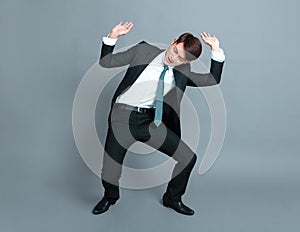 Young business man lifting something