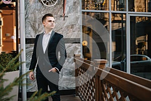 Young business man near of modern building