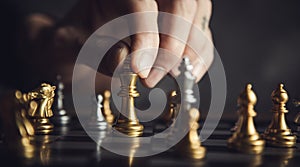 young business man playing chess