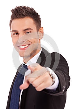 Young business man pointing