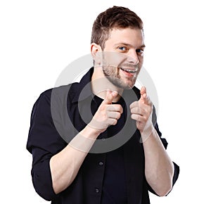 Young business man pointing to the camera on white