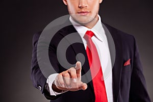 Young business man selecting something