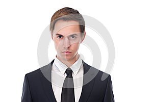 Young business man with serious expression on his face