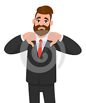 Young business man showing thumbs down sign, dislike, looks withYoung business man showing thumbs down sign, dislike, looks with n