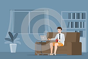 Young business man is sitting and working with laptop on the sofa at home. Online job in social for safety and to protect him from