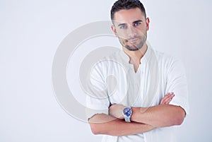 Young business man standing isolated on white background