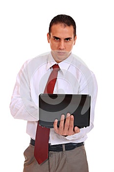 Young business man standing with laptop