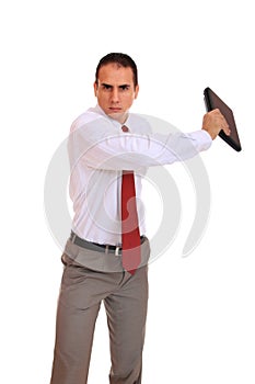 Young business man standing with laptop