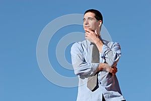 Young business man thinking