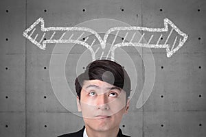 Young business man thinking